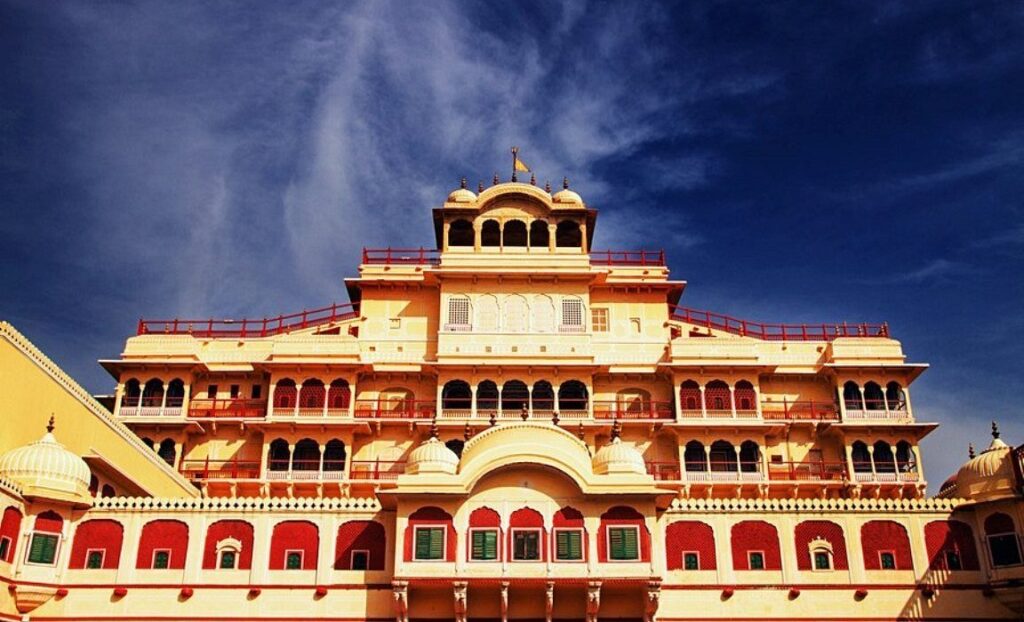 City Palace Jaipur shining in golden sunlight, showcasing royal architecture, grand courtyards, and timeless beauty of Rajasthan’s Pink City.