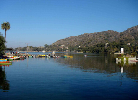 Mount Abu hill station with serene lakes, lush Aravalli hills, ancient temples, and peaceful scenic views for travelers.”